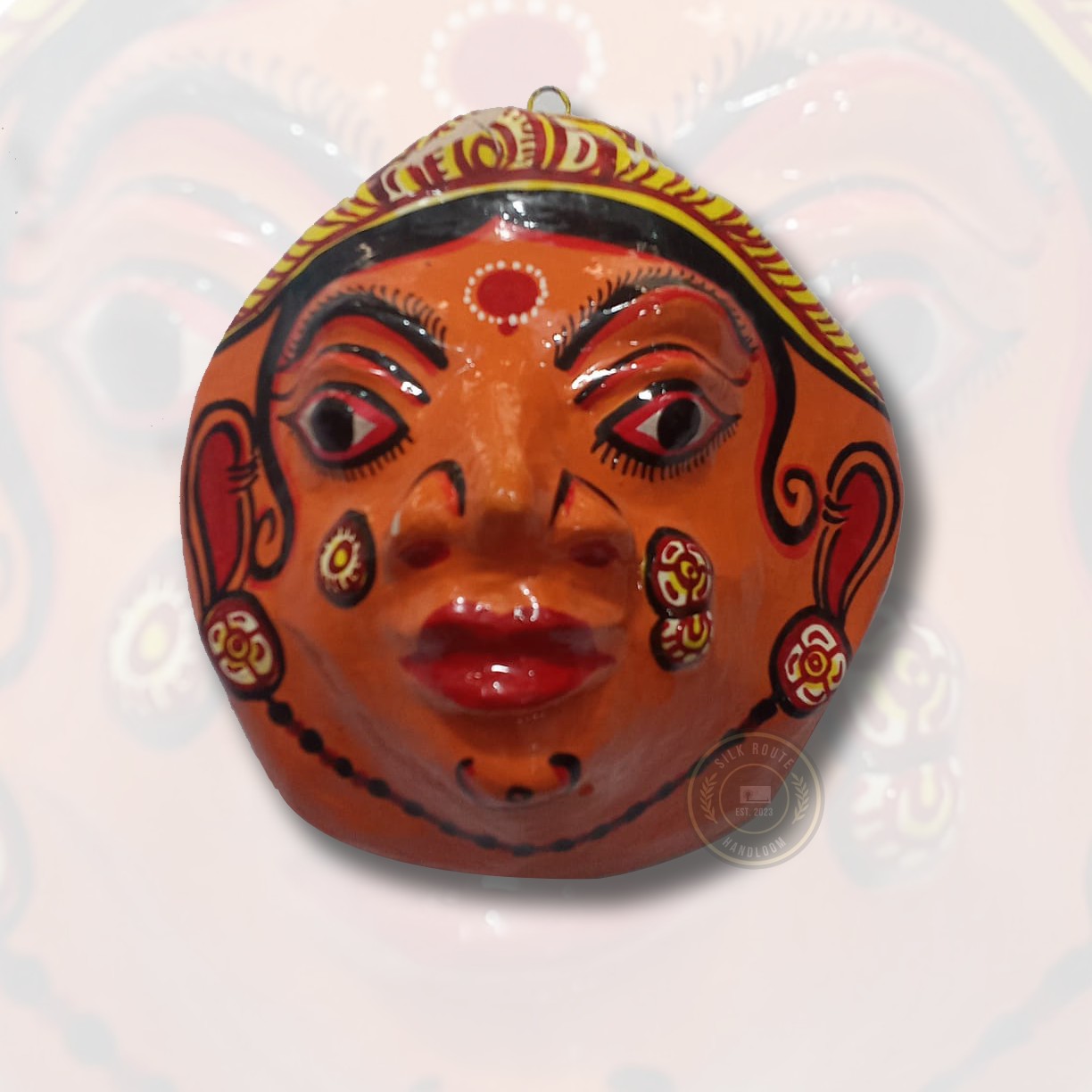 Handicraft brown Odisha hand-painted face mask adds timeless ethnic beauty to your décor—buy now.