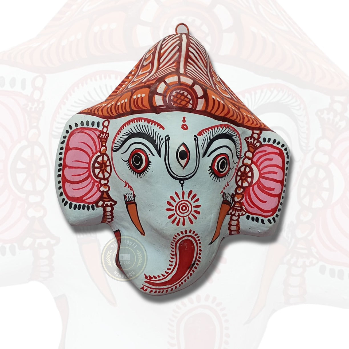 Bring home divine Odisha craftsmanship with this handicraft hand-painted Ganesha mask wall hanging—buy now.