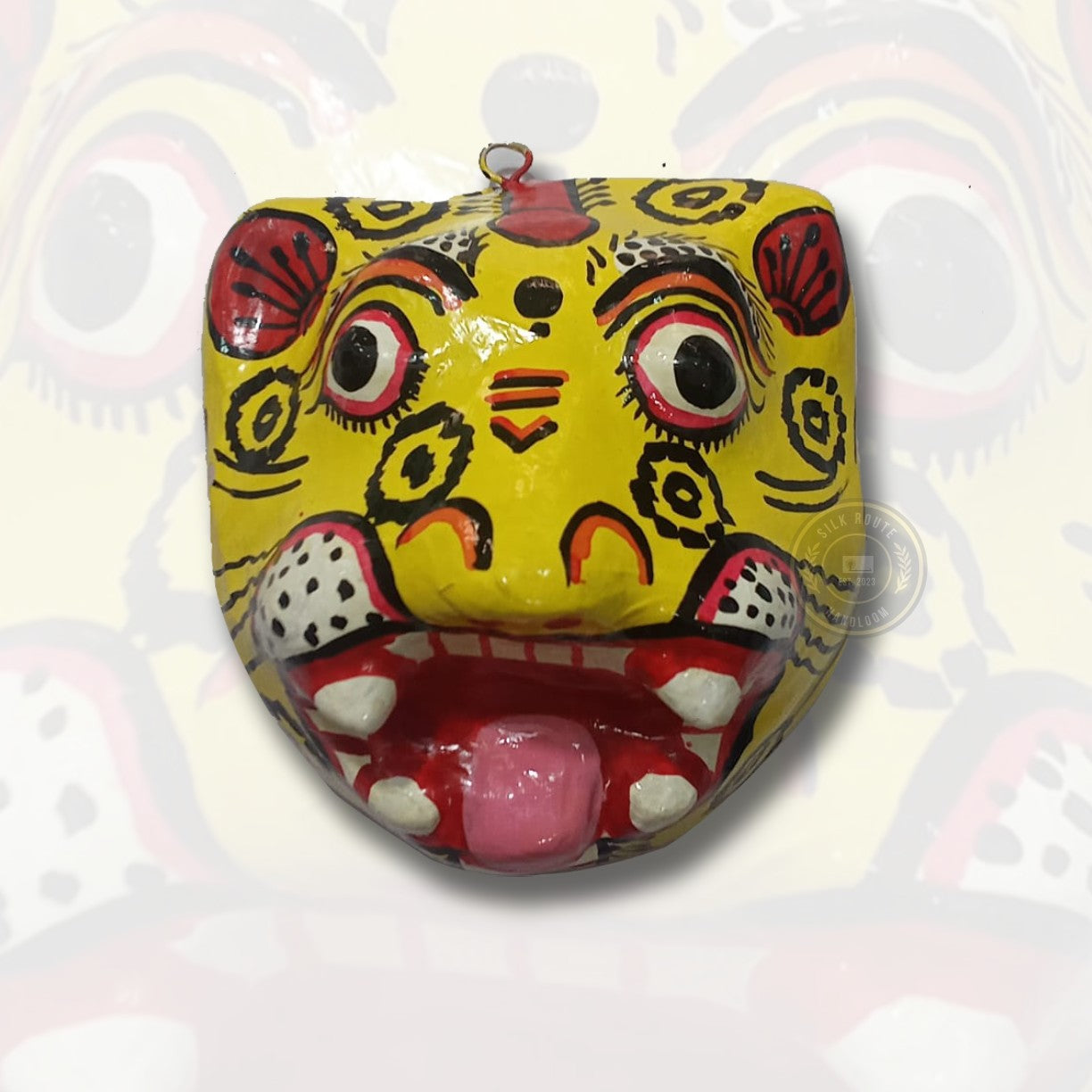 Add bold Odisha folk charm to your décor with this handicraft hand-painted wall hanging face mask—buy now.