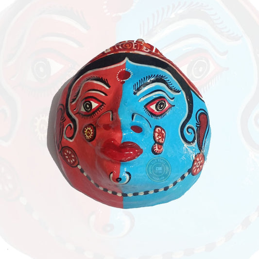 Buy this Odisha handicraft decorative mask with a unique dual-color design, perfect for adding ethnic charm to your space.
